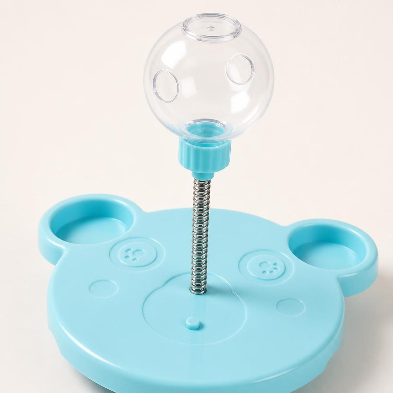 PuzzlePounce blue treat puzzle toy with side treat wells and clear globe