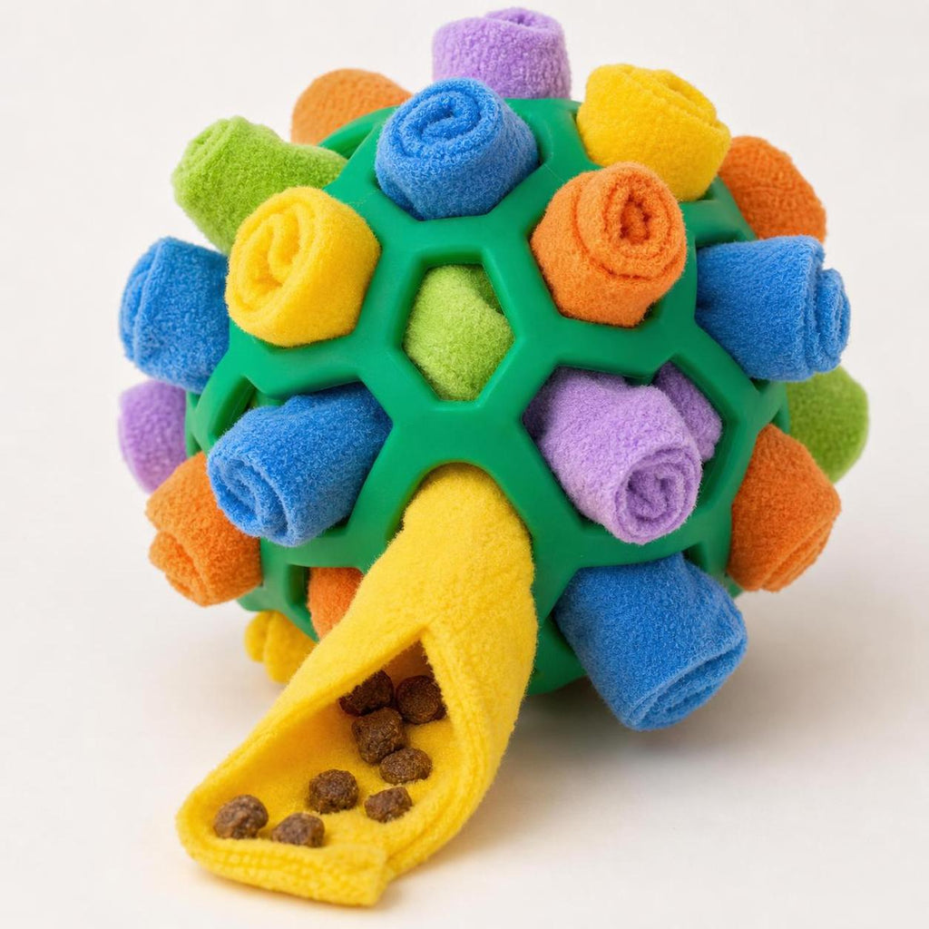 Wag Cabin SniffQuest snuffle ball close-up showing rolled fleece strips and hidden treats