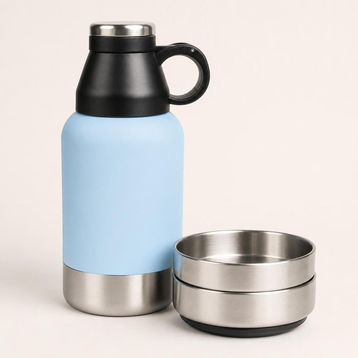 Wag Cabin TrailSip side view with black handle and stacked stainless bowls